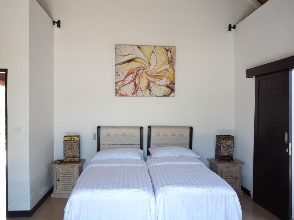 Taman Dewi Sri Villa Et Bungalow Пемутеран Номер фото